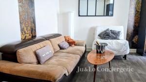 Appartements La Taniere de Saint Jacques : photos des chambres