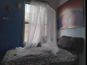 Habitación sencilla en la Casa del Colibrí