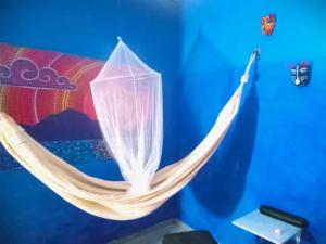 Habitación sencilla en la Casa del Colibrí