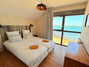 Villas Le Chantier d -Ernest- Loft T4 les pieds dans l- eau : photos des chambres