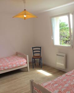 Maisons de vacances A 900 metres de la plage de Kerhillio Maison lumineuse pour 6 personnes : photos des chambres