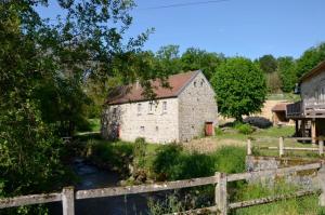 Renovated water mill next to the river Tardes