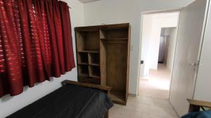 Casa Amplia 2 Dormitorios con Cochera Cerrada y Patio privado