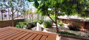 Apartment Vega with private garden, terrace and garage