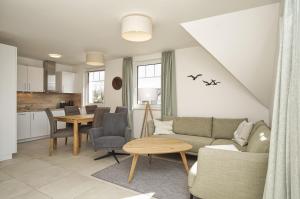 Rex Rugia FeWo12-7 mit Schwimmbadnutzung im AHOI-Sellin