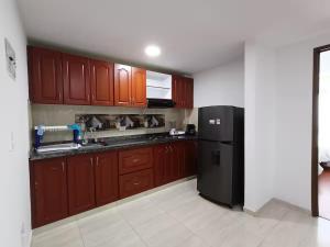 Apartamento de 5 estrellas cerca del aeropuerto, Wifi, cowork en Bogotá