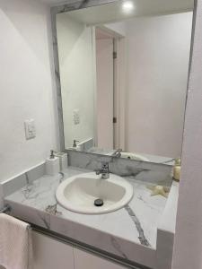 Beach front and lagoon view condo in Cancun