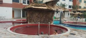 Flat em Caldas Novas no Golden Dolphin Supreme e próx Shopping Singapura com Utensílios e conforto