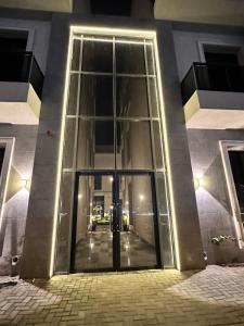 An apartment with two bedrooms a living room and a kitchen شقة غرفتين نوم وصالة ومطبخ