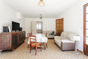 Maisons de vacances Maison au Coeur de Grand Village : photos des chambres