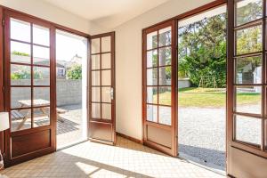 Maisons de vacances Maison au Coeur de Grand Village : photos des chambres