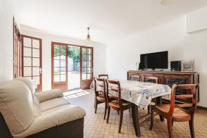 Maisons de vacances Maison au Coeur de Grand Village : photos des chambres