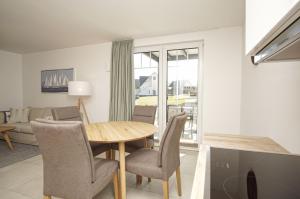 Rex Rugia FeWo12-4 mit Schwimmbad und Saunanutzung im AHOI-Erlebnisbad Sellin