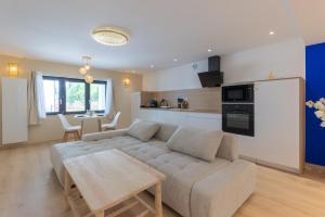 Appartements L-Andalouse - SPA Privatif - Jacuzzi Hammam Sauna : photos des chambres