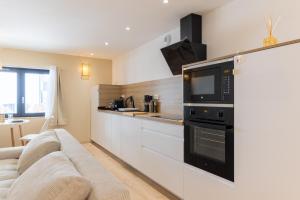 Appartements L-Andalouse - SPA Privatif - Jacuzzi Hammam Sauna : photos des chambres
