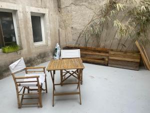 Appartements Studio cosy avec cour privative : photos des chambres