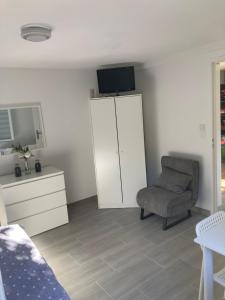 Sejours chez l'habitant Chambre comme un petit logement : photos des chambres