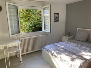 Sejours chez l'habitant Chambre comme un petit logement : photos des chambres