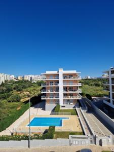 Modern apartment with pool and close to the beach