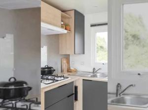 Campings Camping 4 etoiles - Piscine - efceih : photos des chambres