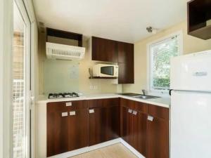 Campings Camping 4 etoiles - Piscine - efceih : photos des chambres