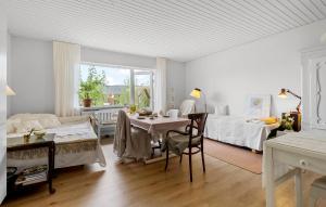 Cozy Home In Årslev With Wifi