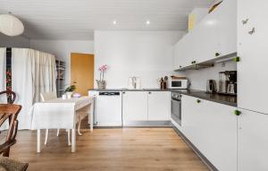 Cozy Home In Årslev With Wifi