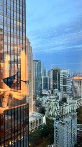 Qian's House Wanyu All-Suite Holiday Apartment