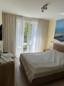 Pokoje Gościnne - Port