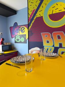 Appartements Capsule retour vers le futur : photos des chambres