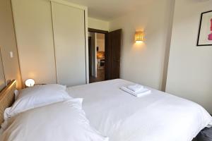 Appartements Magnifique T3 vue mer, Piscine et plage prive : photos des chambres