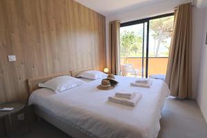 Appartements Magnifique T3 vue mer, Piscine et plage prive : photos des chambres