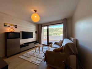Appartements Homency - Residence Fermes de l-Alpe D101 : photos des chambres