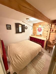 Appartements Appartement dans Chalet avec Jardin : photos des chambres