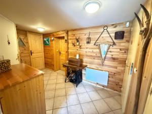 Appartements Appartement dans Chalet avec Jardin : photos des chambres