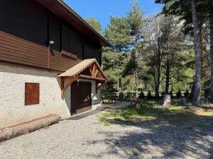 Appartements Appartement dans Chalet avec Jardin : photos des chambres