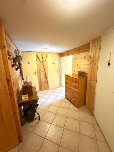 Appartements Appartement dans Chalet avec Jardin : photos des chambres
