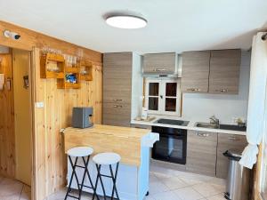 Appartements Appartement dans Chalet avec Jardin : photos des chambres