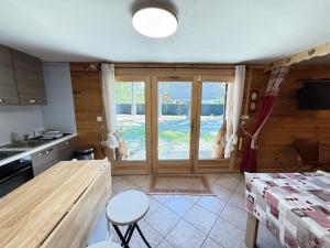 Appartements Appartement dans Chalet avec Jardin : photos des chambres