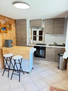 Appartements Appartement dans Chalet avec Jardin : photos des chambres