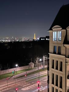 Appartements Studio Luxe - Vue Tour Eiffel - Proche Paris & Versailles : photos des chambres