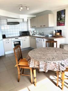 Appartements Appartement Coutain face Mer : photos des chambres