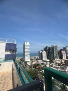 Aconchego no Canto do Forte - Ar Condicionados - Tvs Grandes - Wi-fi e Estacionamento Incluso!