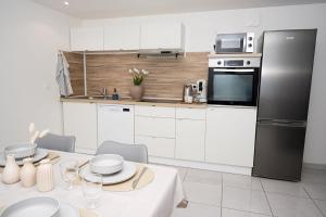 Appartements L-Elegant aux portes de Geneve : photos des chambres
