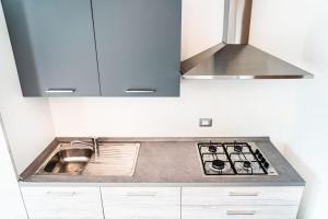 Tastefully furnished flat with pool and green area