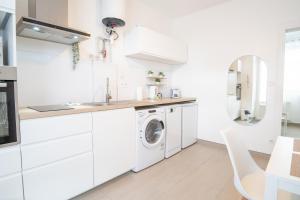 Appartements Le Petit Clos-y - Appart hypercentre avec parking + terrasse : photos des chambres