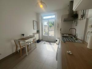 Appartements Le Petit Clos-y - Appart hypercentre avec parking + terrasse : photos des chambres