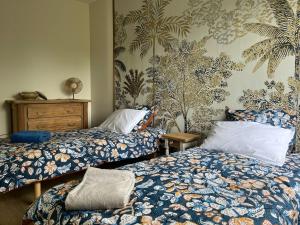 Maisons de vacances Gite Ecrin de Verdure Jacuzzi et piscine : photos des chambres