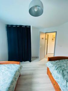 Maisons de vacances Au charmant sarment : photos des chambres