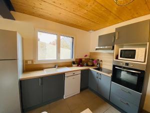 Maisons de vacances Au charmant sarment : photos des chambres